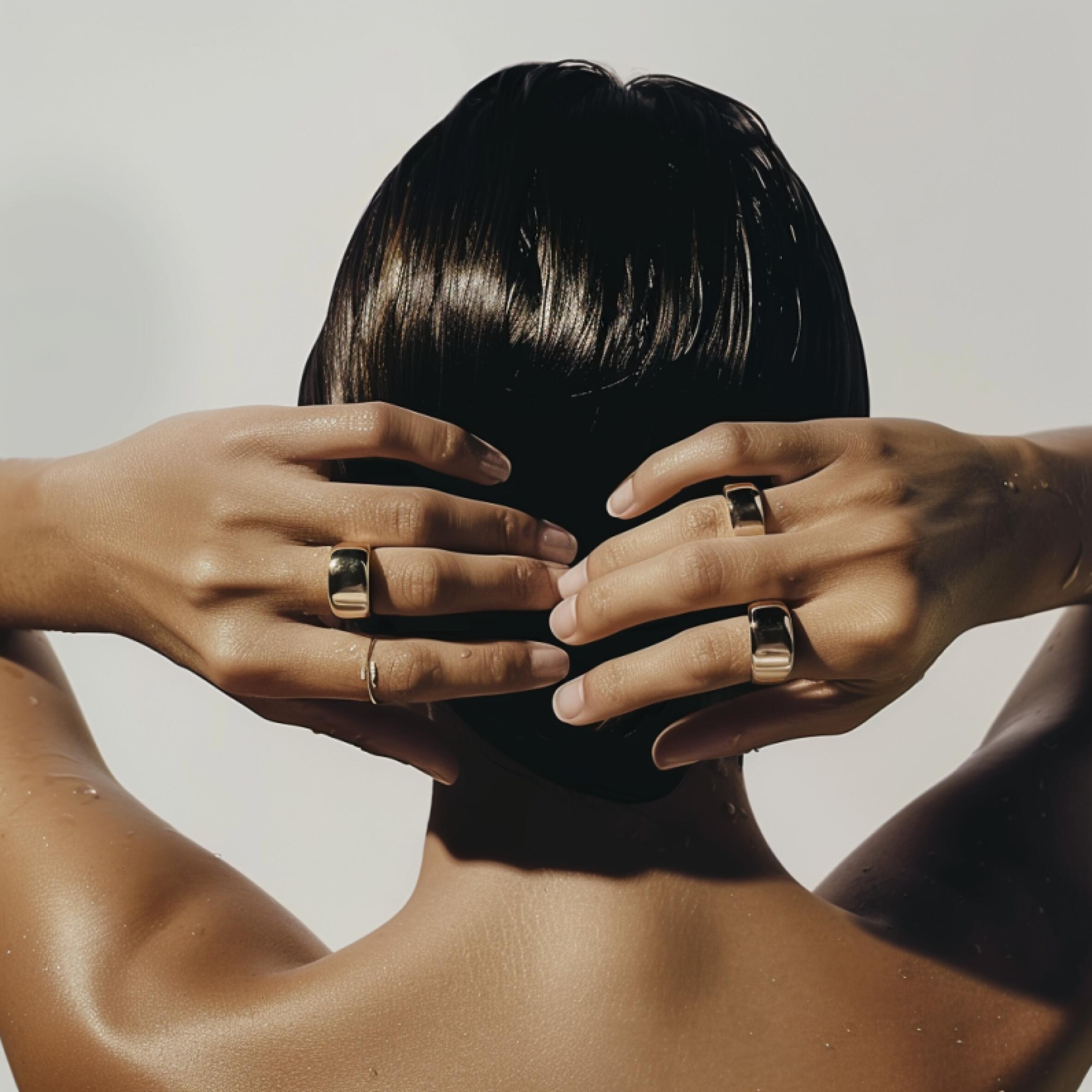 Model wearing thick 12mm gold rings