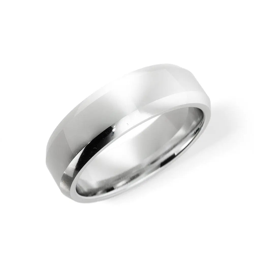 Angled photo of a 6mm platinum wedding band with beveled edges and comfort fit, handcrafted in NYC.