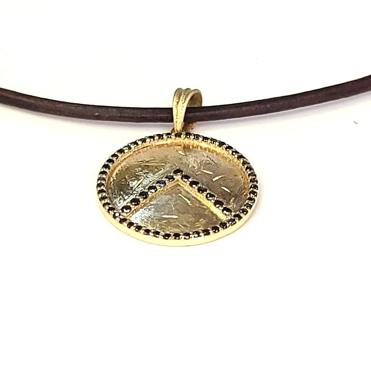 The Shield of Leonidas: A Warrior’s Legacy in 14K Gold