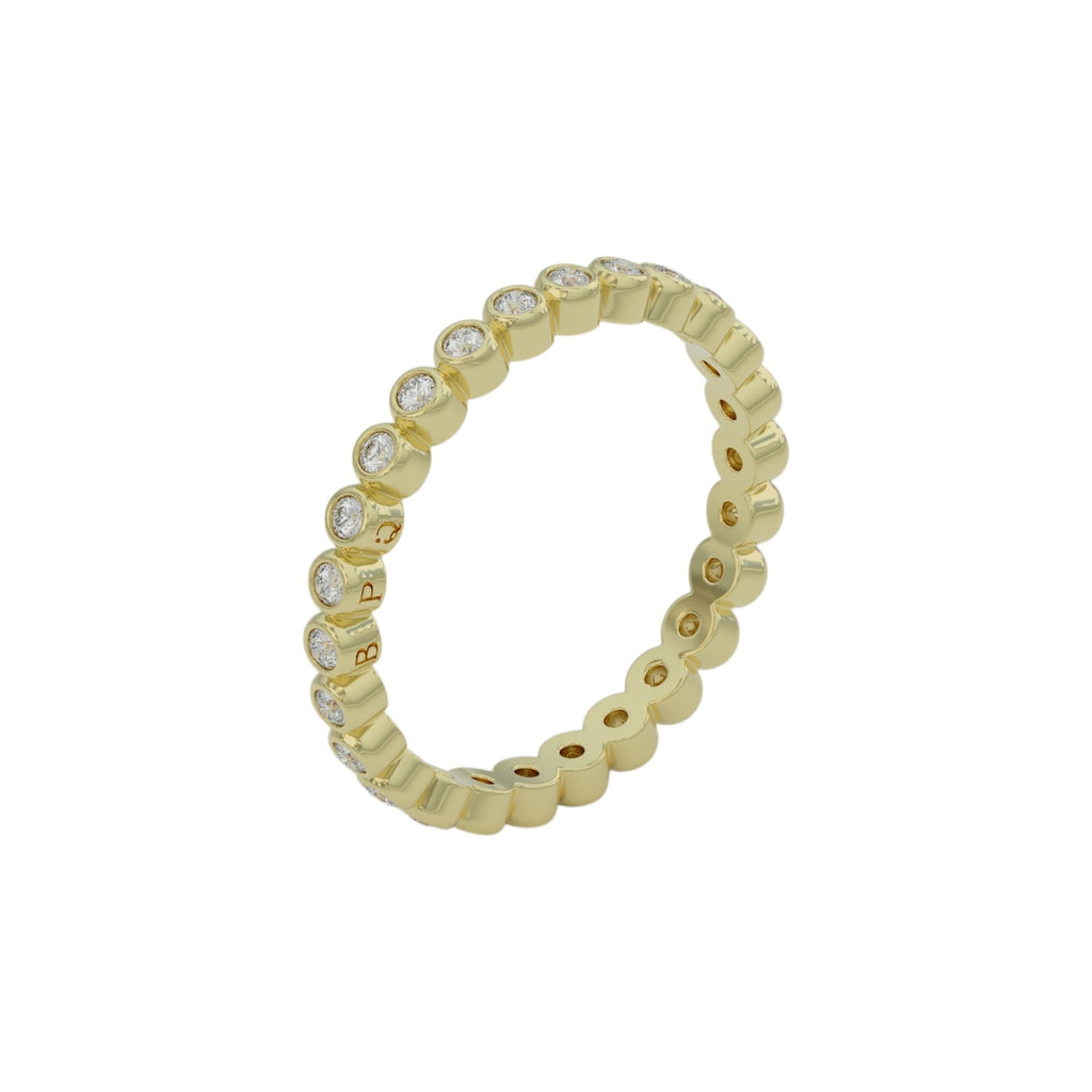 Side view of 1.5mm bezel-set diamond wedding band in 14K yellow gold, full eternity design