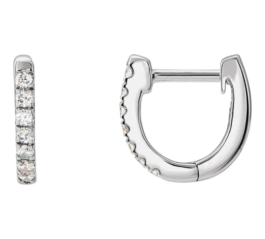 Close-up of handcrafted diamond hoop earrings for timeless elegance