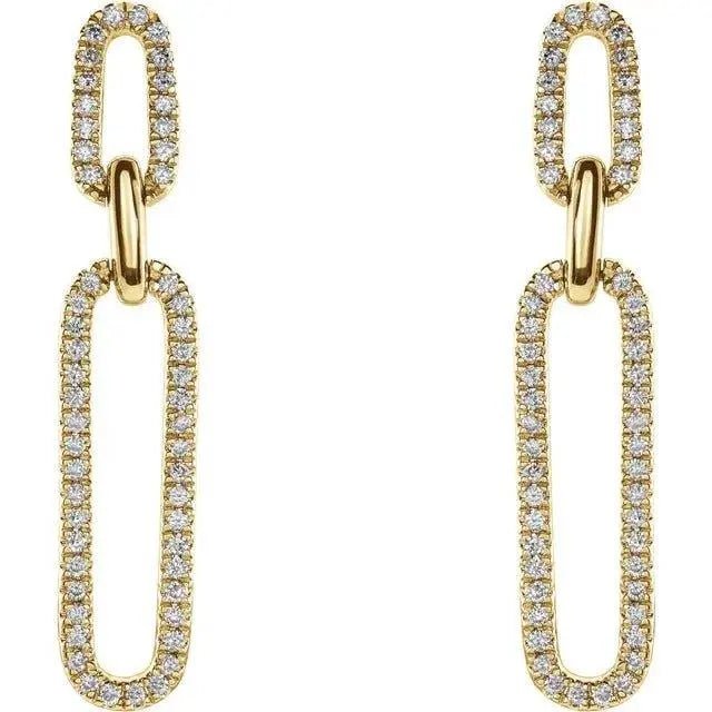 Close-up of diamond paperclip earrings with 1/3 carat total weight in yellow gold.