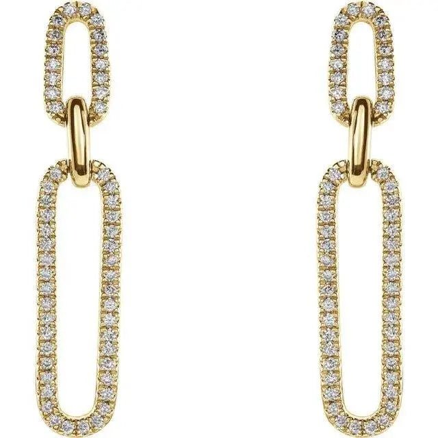 Close-up of diamond paperclip earrings with 1/3 carat total weight in yellow gold.