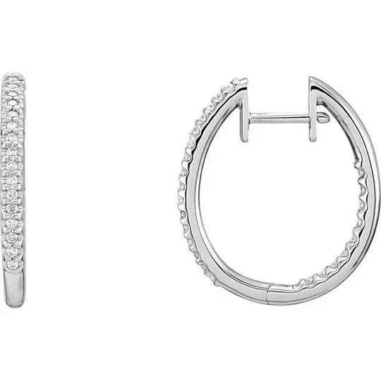 Close-up of white gold diamond hoop earrings with natural diamonds