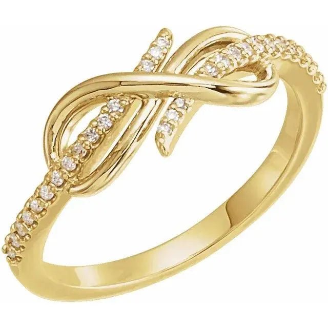 Elegant 14K yellow gold diamond infinity knot ring featuring brilliant-cut diamonds. A timeless custom jewelry piece for women.