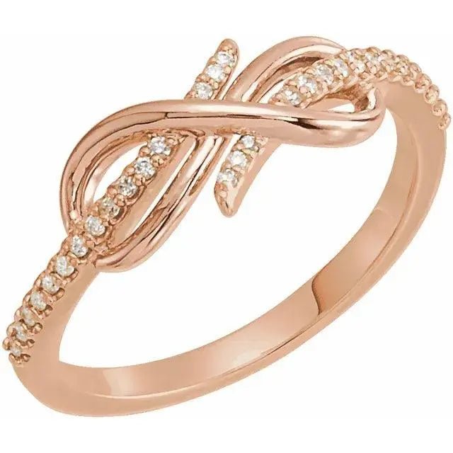 Romantic 14K rose gold diamond infinity knot ring with a delicate and intricate design. A perfect custom-made jewelry piece for her.