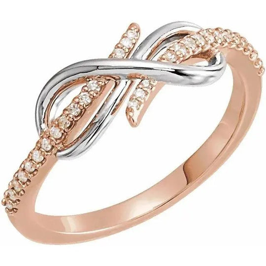 Chic 14K rose gold and silver diamond infinity knot ring, symbolizing eternal love. A luxurious custom jewelry piece for women.