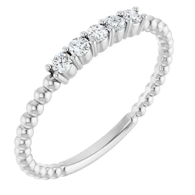 14K white gold diamond stackable bead ring with five diamonds and a beaded band. A sleek minimalist jewelry piece for everyday elegance.