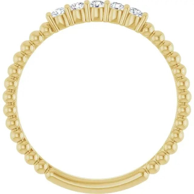 Side profile of 14K gold diamond stackable bead ring showing the beaded band and prong-set diamonds. Ideal for minimalist luxury styling.