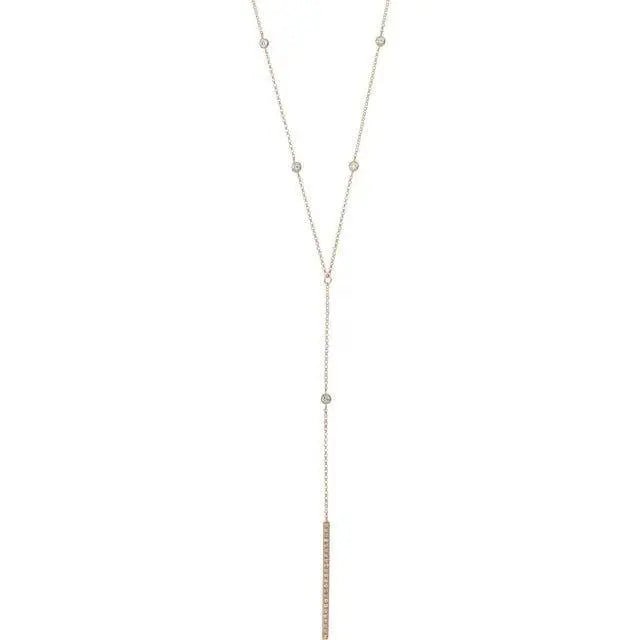 Close-up of 14K gold diamond lariat necklace for women