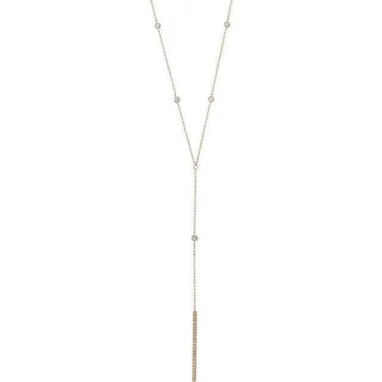 Close-up of 14K gold diamond lariat necklace for women