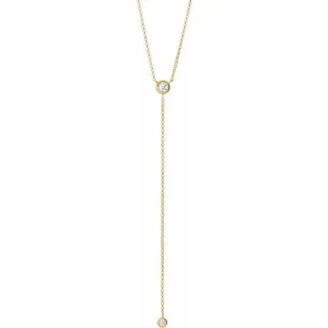 14K gold diamond Y necklace featuring a 1/5 carat lariat pendant