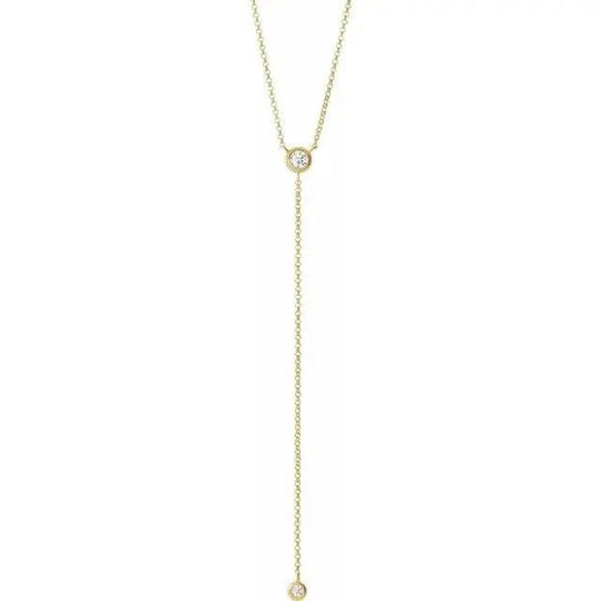 14K gold diamond Y necklace featuring a 1/5 carat lariat pendant