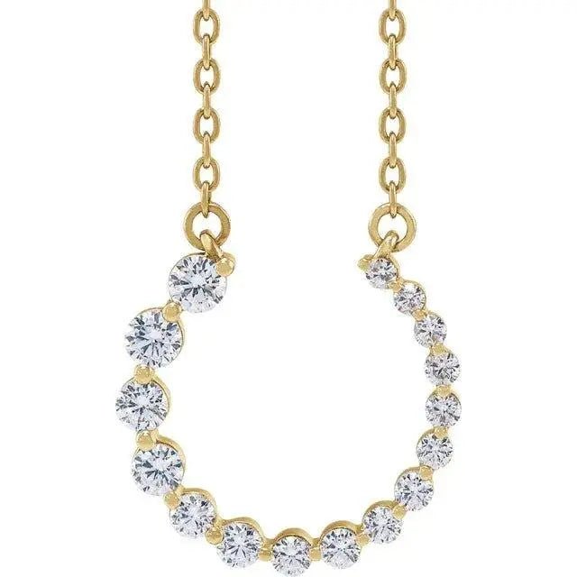 Close-up photo of 3/8ct graduated diamond necklace in 14K gold, handcrafted in NYC.