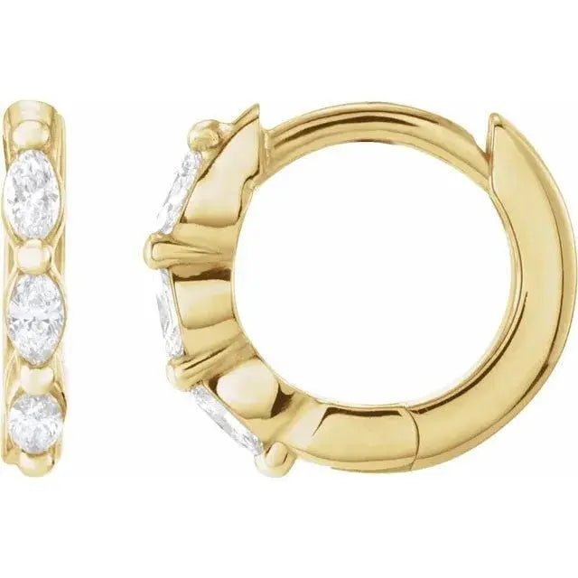 Yellow gold hoop earrings with shimmering marquise diamonds