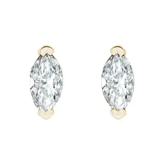 Dainty diamond stud earrings featuring natural marquise-cut diamonds.