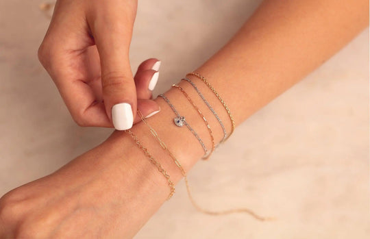 Close-up of 14K gold paperclip chain bracelet for everyday wear