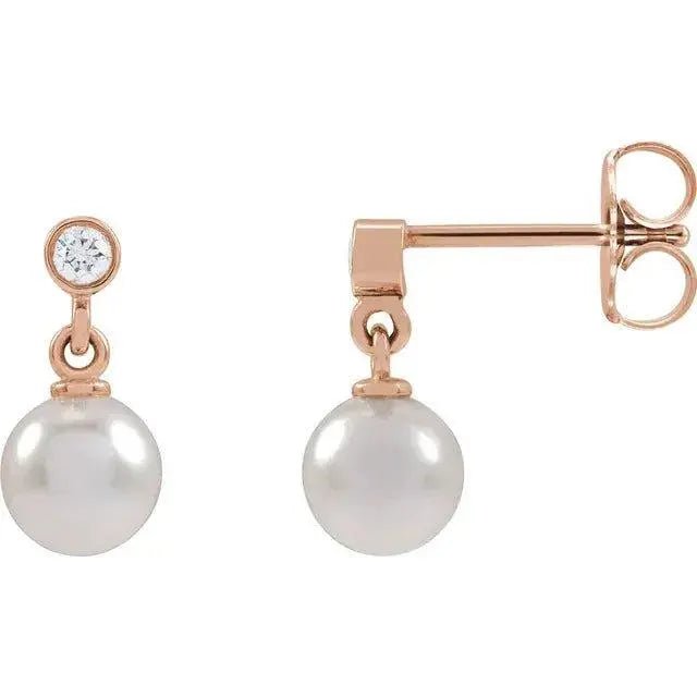 Rose gold pearl and diamond earrings with classic design