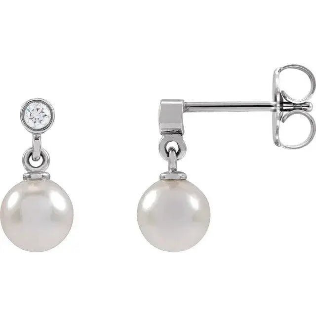 Luxury pearl and diamond earrings with secure backing