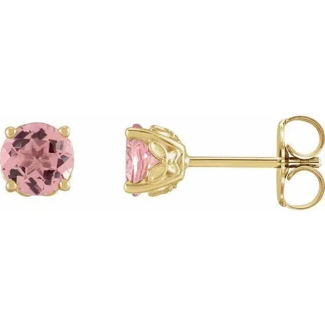 Close-up photo of 14K gold pink tourmaline stud earrings with natural gemstones, handcrafted in NYC.