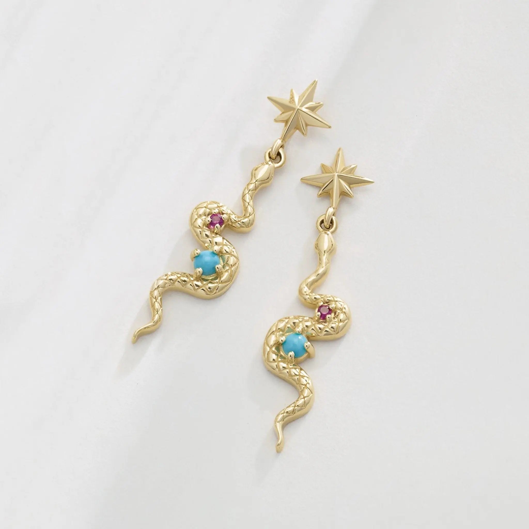 Handcrafted 14K gold earrings with snake motif