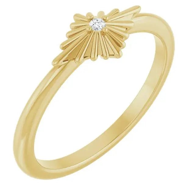 Close-up photo of 14K gold starburst diamond ring with natural diamonds, handcrafted in NYC.