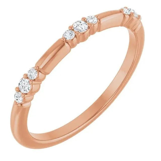 Rose gold 14K stationed diamond stackable ring featuring dazzling diamonds along a delicate band. Ideal for stacking or wearing alone.