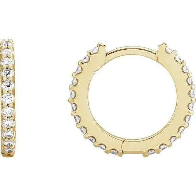 Close-up photo of 14K gold 14mm hoop earrings with pavé-set natural diamonds, handcrafted in NYC.