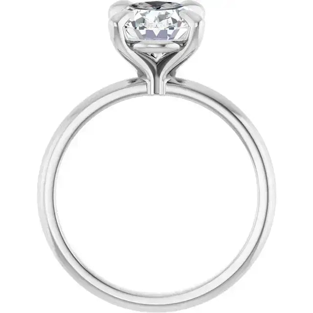 Handcrafted oval diamond engagement ring with four-prong setting by Dimitrios Creations