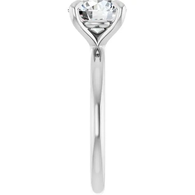 Handcrafted round brilliant engagement ring by Dimitrios Creations