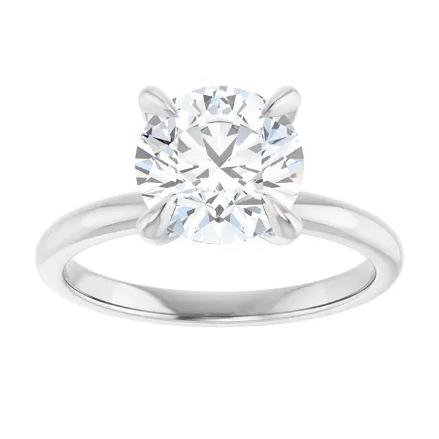 Classic round diamond ring in gold by Dimitrios Creations