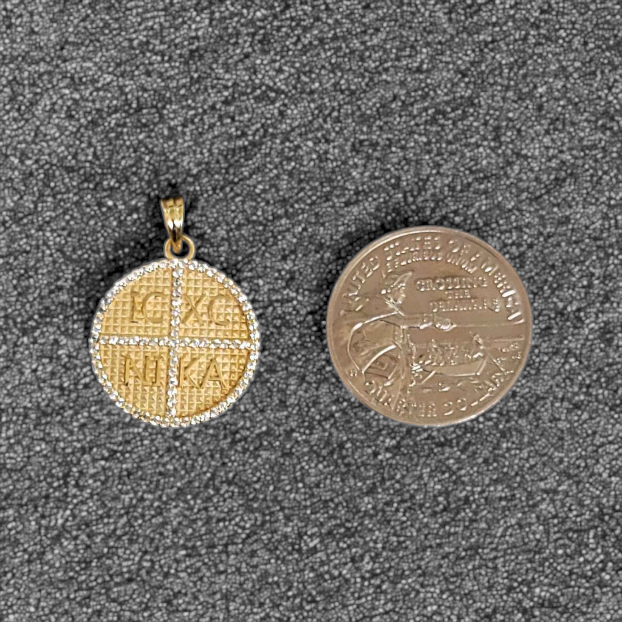 14K gold Byzantine victory amulet with VS diamonds shown next to quarter for size reference by Dimitrios Creations

