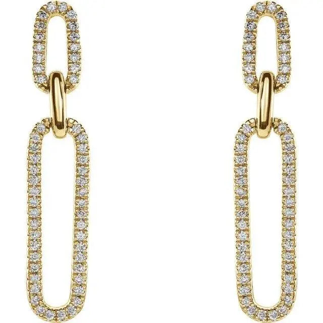 Close-up of diamond paperclip earrings with 1/3 carat total weight in yellow gold.