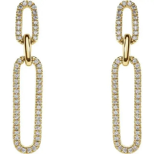 Close-up of diamond paperclip earrings with 1/3 carat total weight in yellow gold.