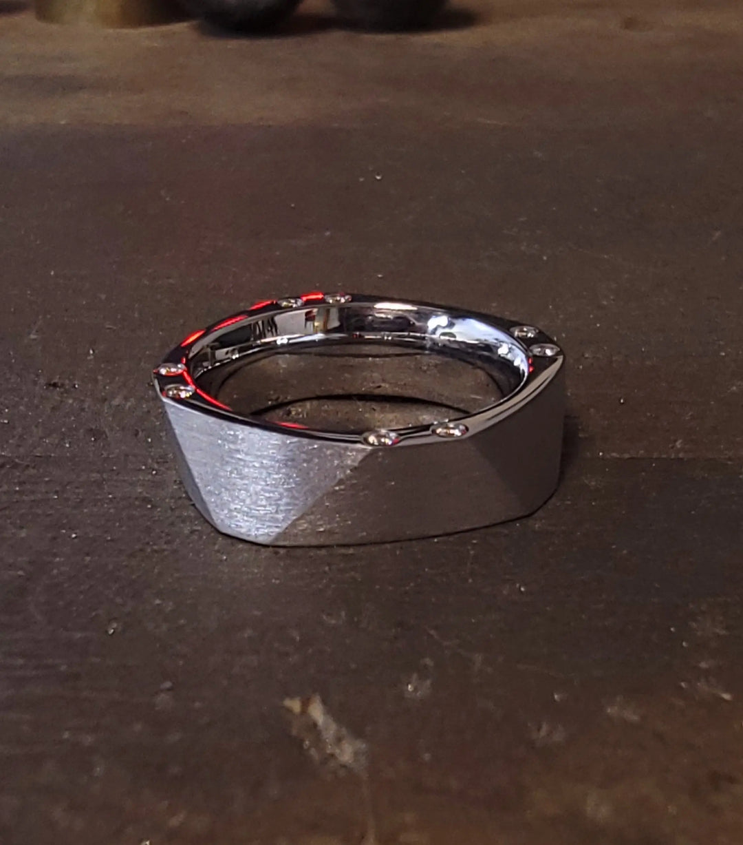 Ethically sourced materials used in abstract ring – lifestyle image.