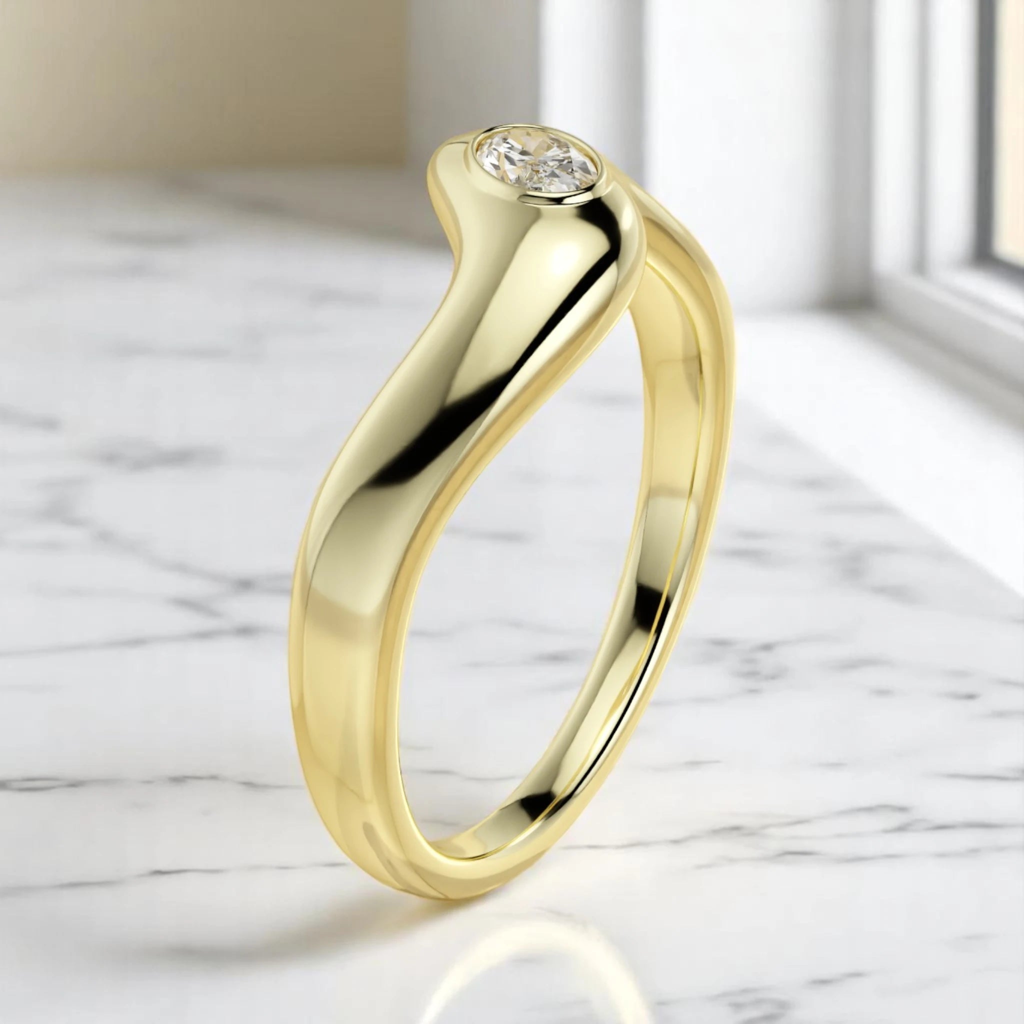 Modern gold ring with organic curves and 0.171 CT oval lab diamond in high-polish bezel setting