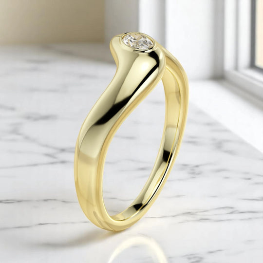 Modern gold ring with organic curves and 0.171 CT oval lab diamond in high-polish bezel setting