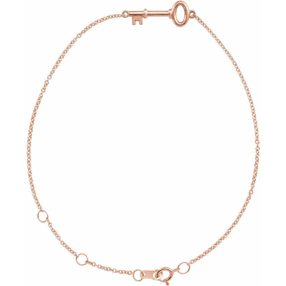 Gold sliding clasp bracelet with key charm by Dimitrios Creations