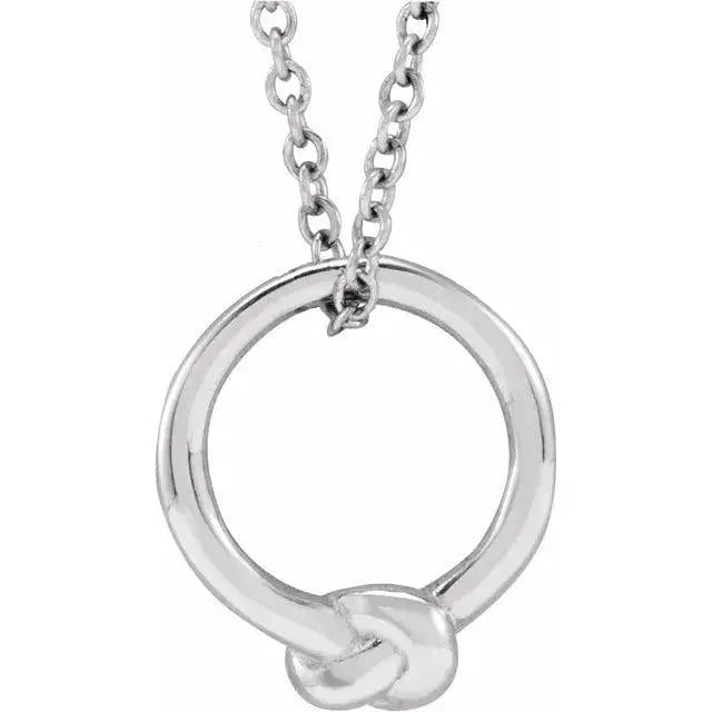 Sterling Silver Love Knot Necklace featuring an intricate overhand knot pendant on an 18-inch sterling silver chain, symbolizing love and unity.