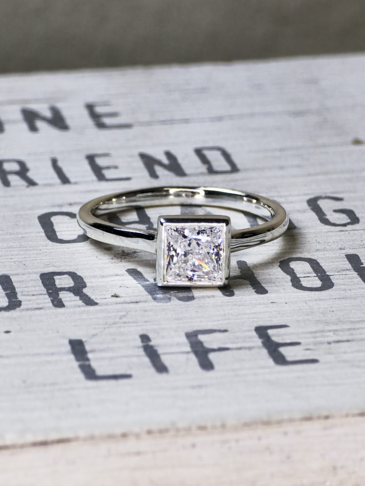 1 carat lab grown square diamond bezel engagement ring in 14K white gold
