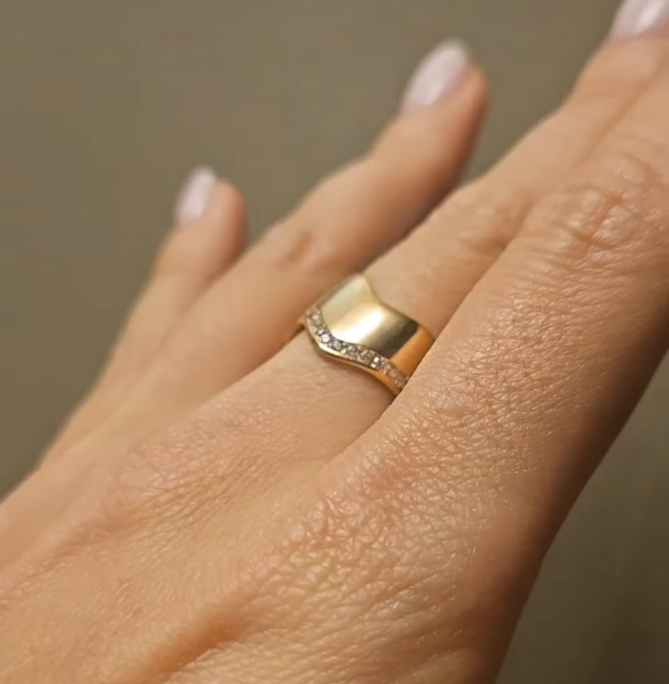 Wave ring in 14k gold on a finger and side view - Dimitrios Crations