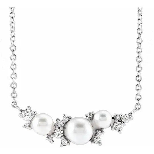 Handcrafted sterling silver necklace with Akoya pearl and diamonds