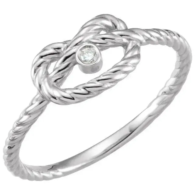 Amara Knot 14K white gold love knot ring featuring a twisted band and a central diamond accent for a sophisticated look.