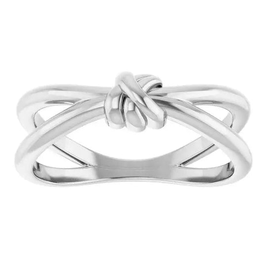 Love Knot Ring paired with other fine jewelry pieces for a sophisticated ensemble.