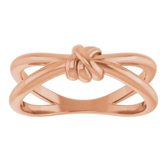 Elegant 14K Rose Gold Love Knot Ring displayed in a luxury jewelry box.