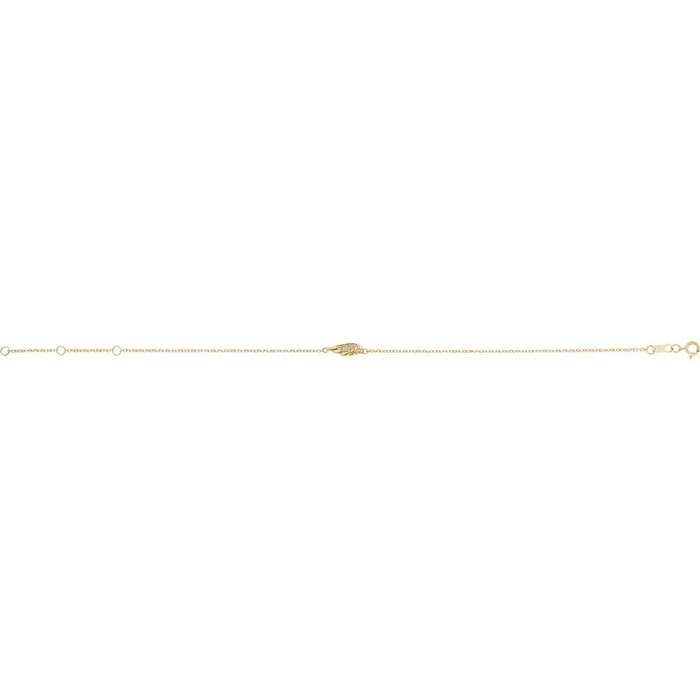 Minimalist angel wing bracelet in 14K gold with diamond accents. Adjustable chain design for a perfect fit, crafted with precision and elegance.