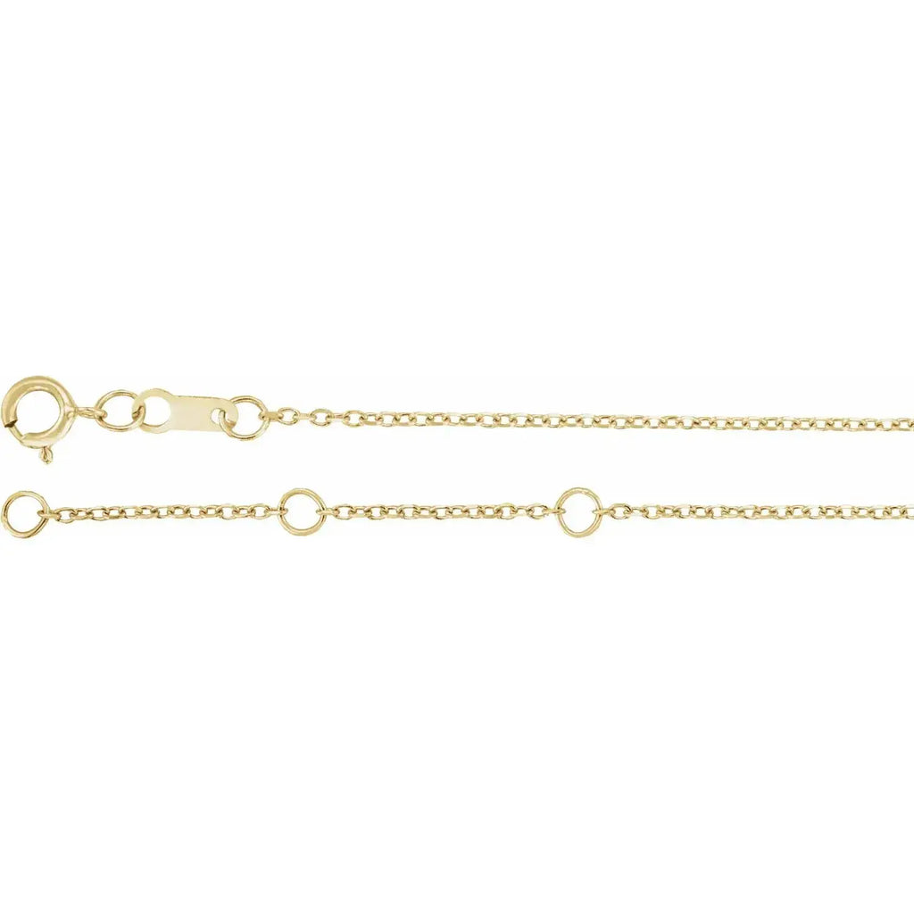 Close-up of the 14K gold angel wing bracelet’s fine chain and secure clasp. A handcrafted diamond bracelet with a symbolic and timeless design.