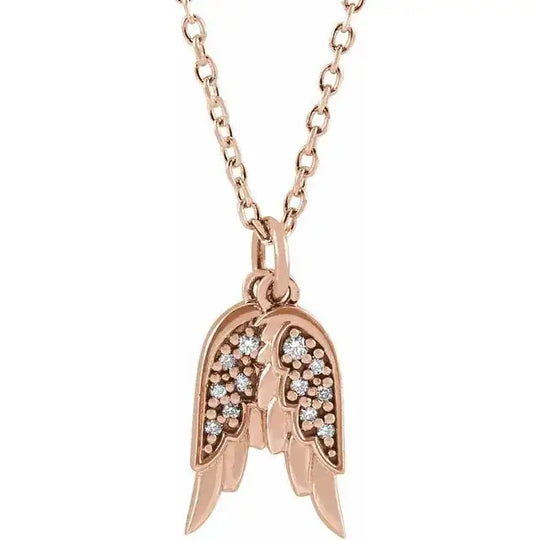 Rose gold Angel Wings Necklace with diamond details. A beautifully handcrafted pendant necklace symbolizing grace and timeless beauty.