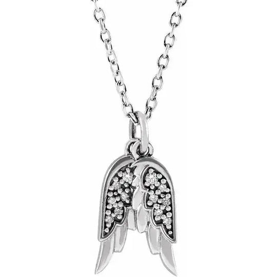 Angel Wings Necklace in white gold with diamond accents. A spiritual and elegant jewelry piece featuring a finely crafted wing pendant.