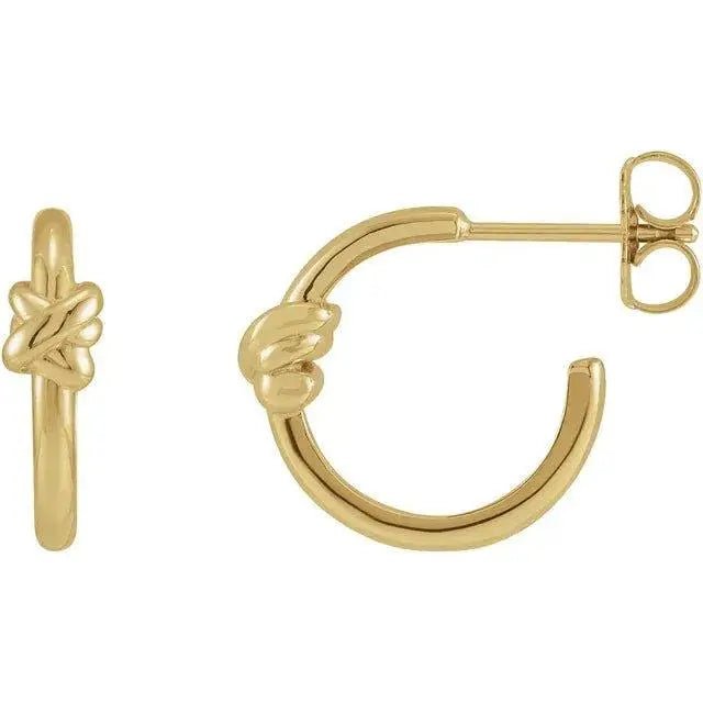 Close-up photo of 14K gold twist knot hoop earrings, handcrafted in NYC.